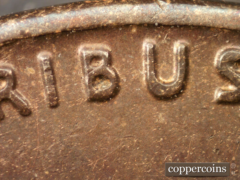 Die-stage B marker on 1942S•1DR•004 (1942 Doubled Die Reverse).