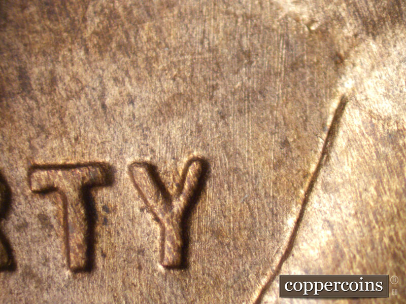 Die-stage B marker on 1942S•1MM•004 (1942 Repunched Mint Mark).