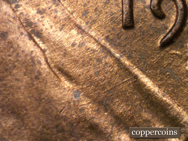 Die-stage B marker on 1942S•1MM•012 (1942 Repunched Mint Mark).