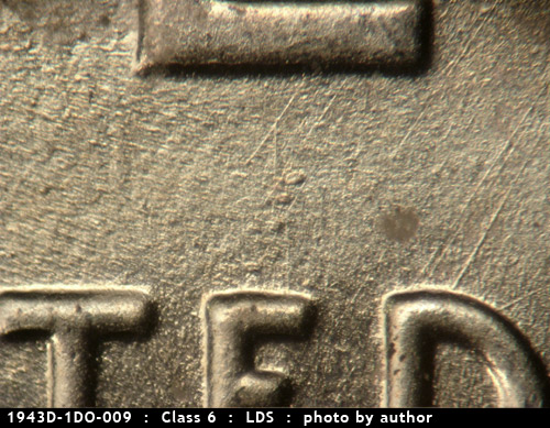 Die-stage C marker on 1943D•1DO•009 (1943 Doubled Die Obverse).