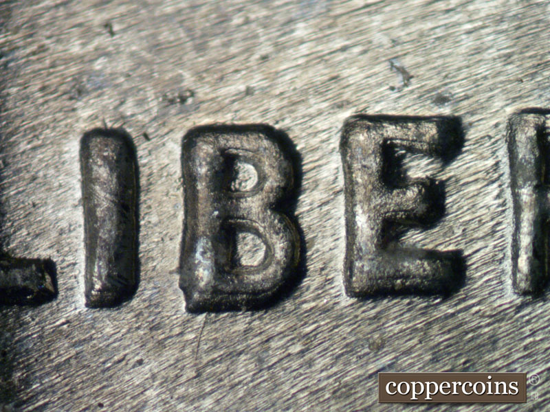 Die-stage B marker on 1943D•1DO•015 (1943 Doubled Die Obverse).