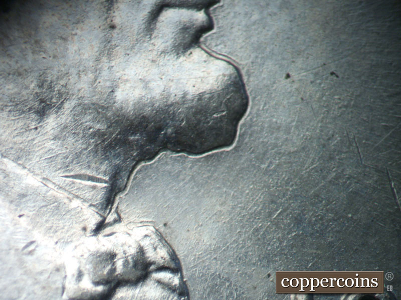 Die-stage B marker on 1943D•1DO•022 (1943 Doubled Die Obverse).