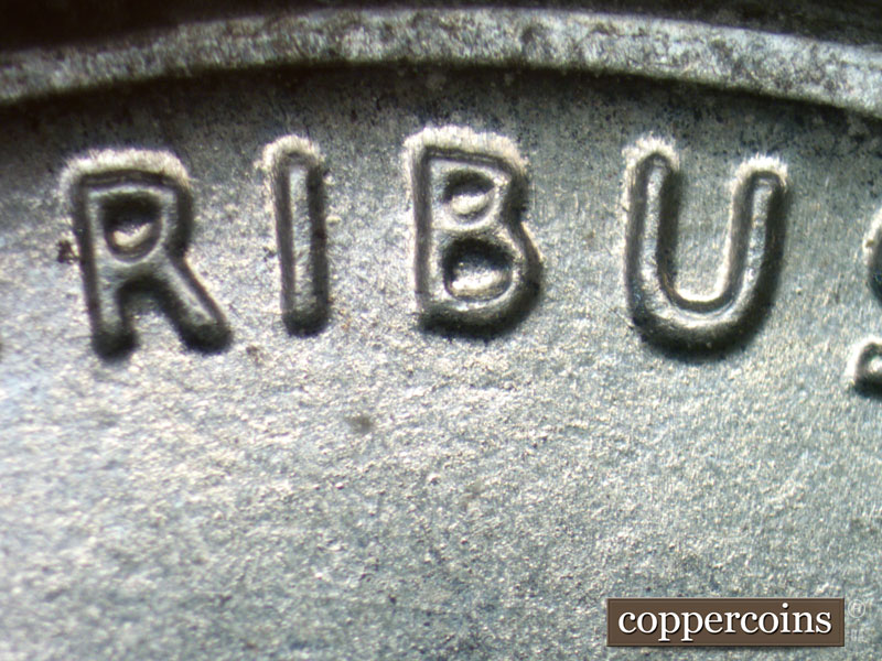 Die-stage B marker on 1943D•1DR•001 (1943 Doubled Die Reverse).