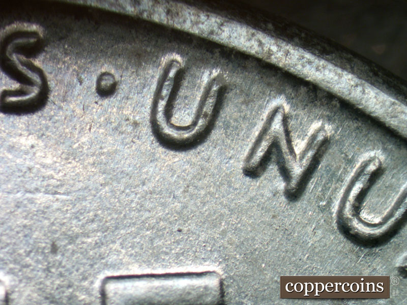 Die-stage B marker on 1943D•1DR•001 (1943 Doubled Die Reverse).
