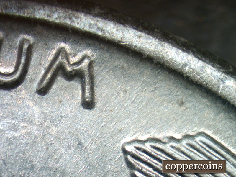 Die-stage B marker on 1943D•1DR•001 (1943 Doubled Die Reverse).