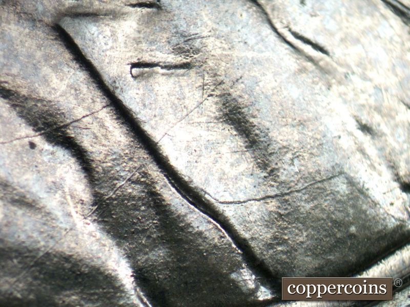 Die-stage B marker on 1943D•1DR•001 (1943 Doubled Die Reverse).