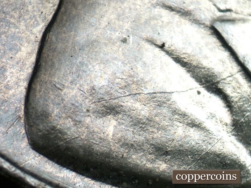 Die-stage B marker on 1943D•1DR•001 (1943 Doubled Die Reverse).