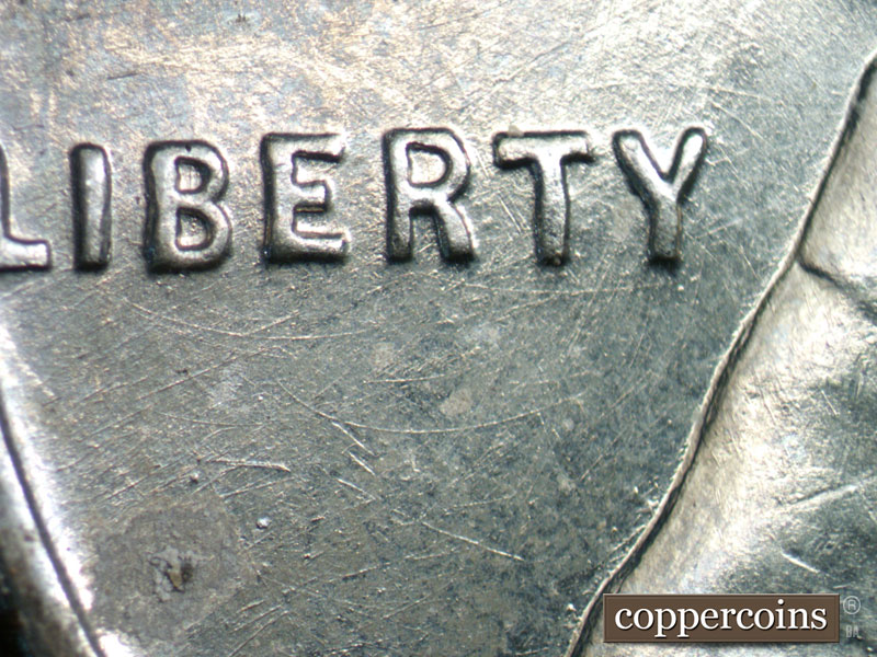 Die-stage B marker on 1943D•1DR•001 (1943 Doubled Die Reverse).