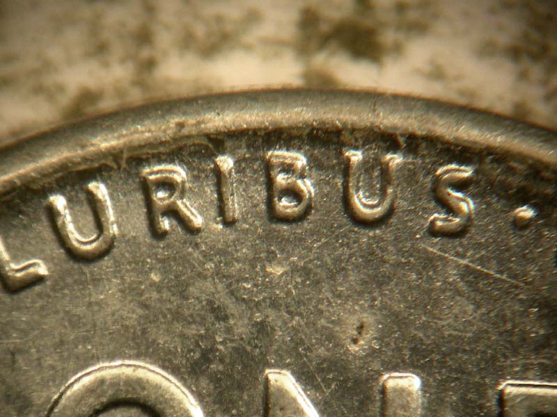 Die-stage B marker on 1943D•1DR•002 (1943 Doubled Die Reverse).