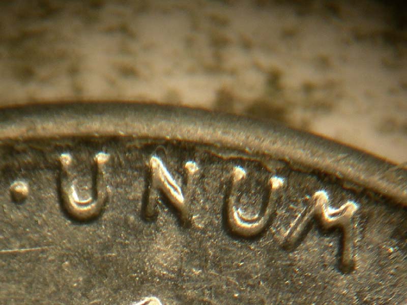 Die-stage B marker on 1943D•1DR•002 (1943 Doubled Die Reverse).