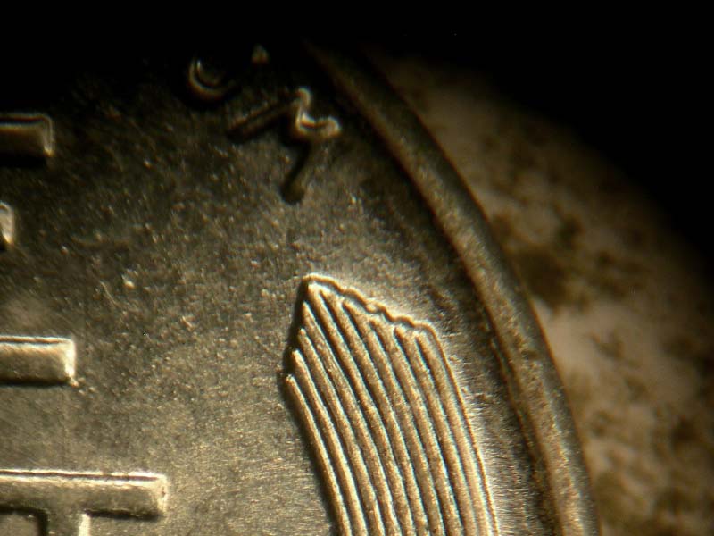 Die-stage B marker on 1943D•1DR•002 (1943 Doubled Die Reverse).