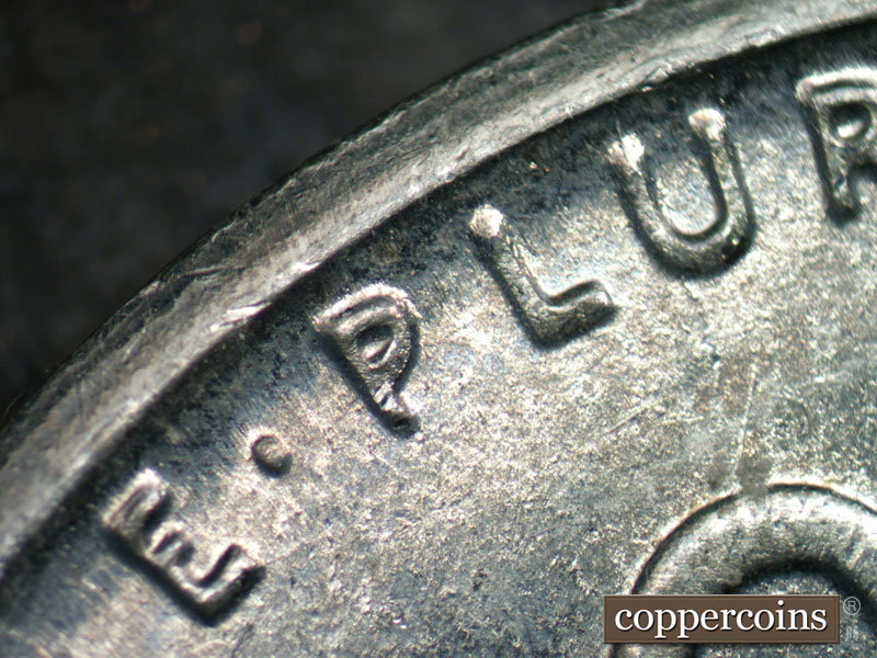 Die-stage B marker on 1943D•1DR•003 (1943 Doubled Die Reverse).