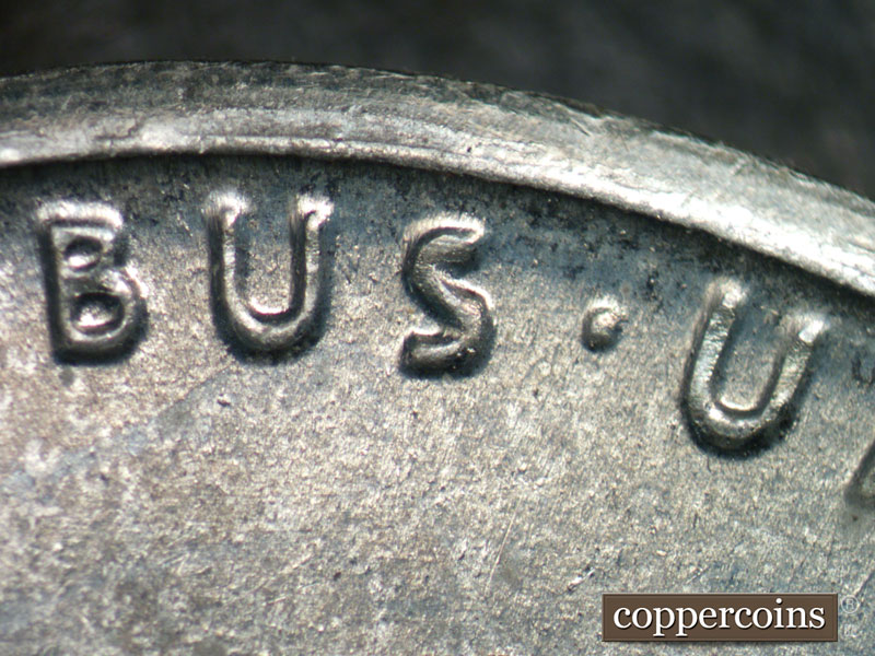 Die-stage B marker on 1943D•1DR•003 (1943 Doubled Die Reverse).