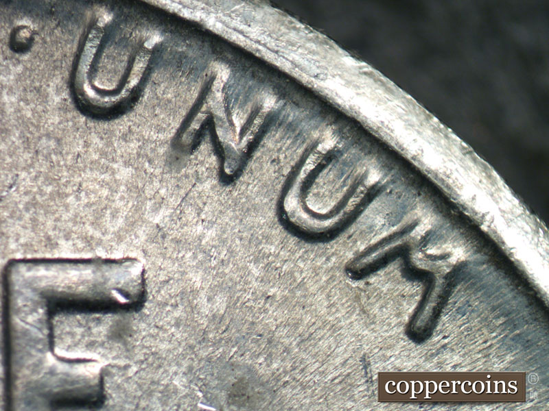 Die-stage B marker on 1943D•1DR•003 (1943 Doubled Die Reverse).