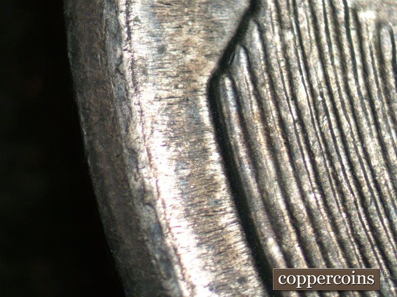 Die-stage B marker on 1943D•1DR•003 (1943 Doubled Die Reverse).