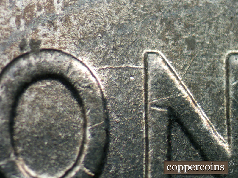 Die-stage B marker on 1943D•1DR•003 (1943 Doubled Die Reverse).