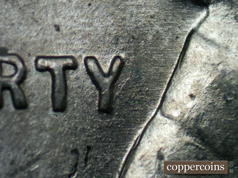 Die-stage B marker on 1943D•1DR•003 (1943 Doubled Die Reverse).