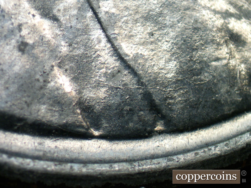 Die-stage B marker on 1943D•1DR•003 (1943 Doubled Die Reverse).
