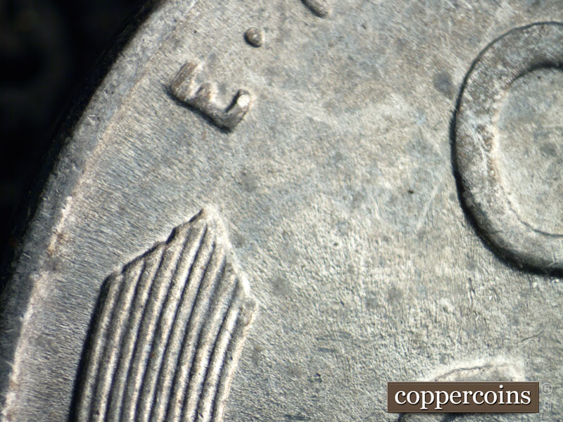 Die-stage B marker on 1943D•1DR•009 (1943 Doubled Die Reverse).