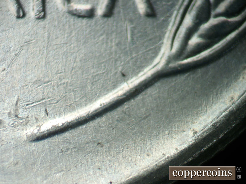 Die-stage B marker on 1943D•1DR•010 (1943 Doubled Die Reverse).
