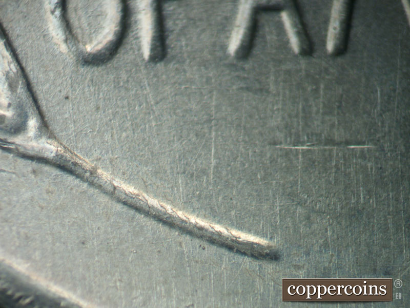 Die-stage B marker on 1943D•1DR•010 (1943 Doubled Die Reverse).