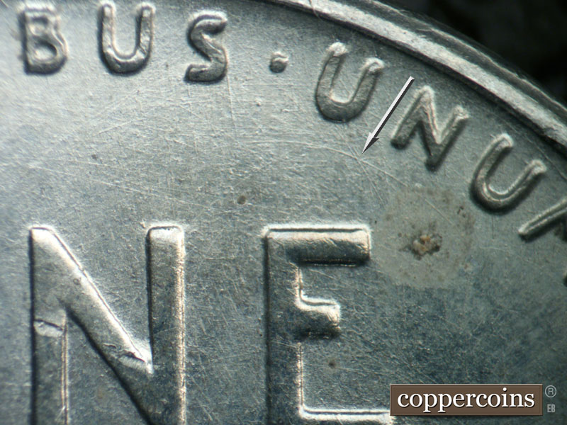 Die-stage B marker on 1943D•1DR•010 (1943 Doubled Die Reverse).
