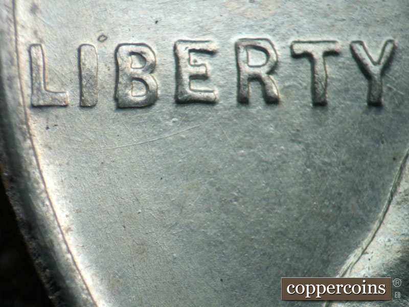Die-stage B marker on 1943D•1DR•010 (1943 Doubled Die Reverse).