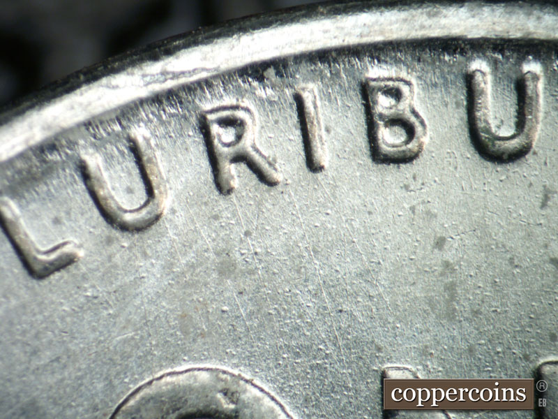 Die-stage B marker on 1943D•1DR•011 (1943 Doubled Die Reverse).