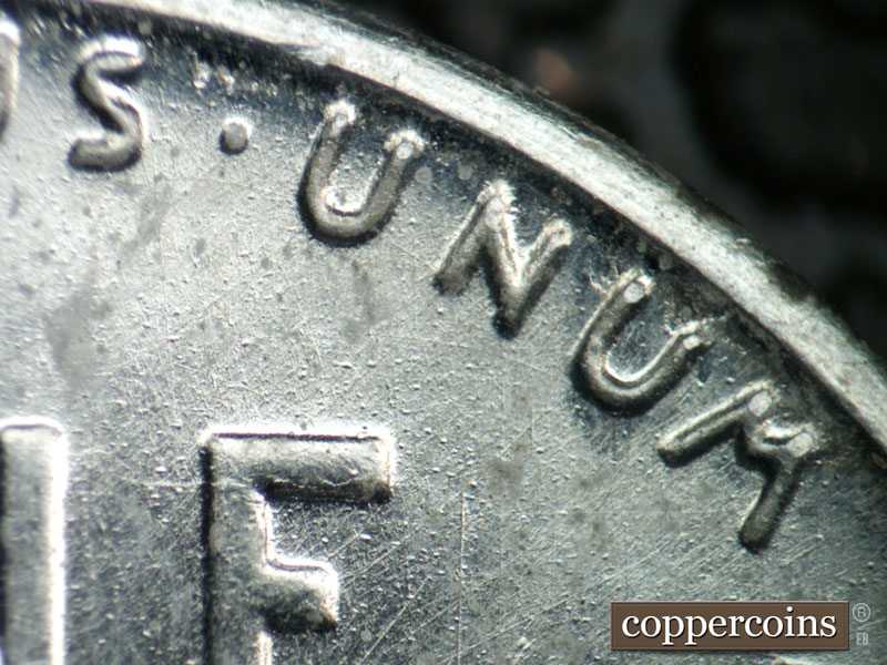 Die-stage B marker on 1943D•1DR•011 (1943 Doubled Die Reverse).