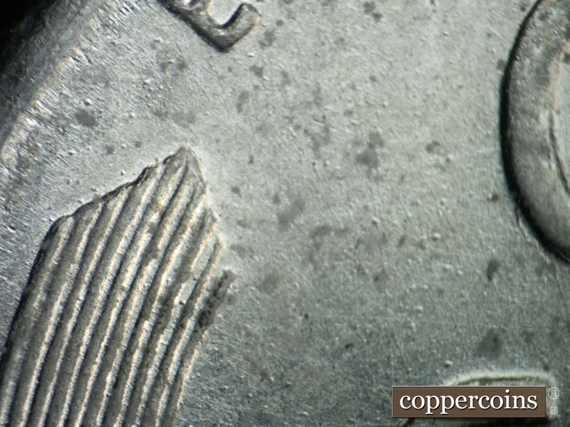 Die-stage B marker on 1943D•1DR•011 (1943 Doubled Die Reverse).