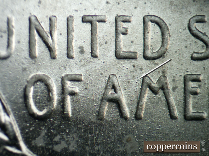 Die-stage B marker on 1943D•1DR•011 (1943 Doubled Die Reverse).