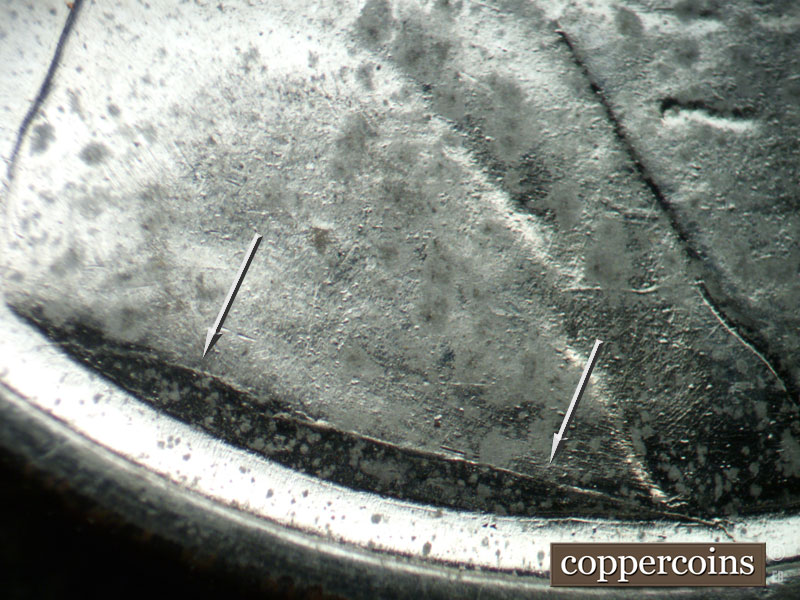 Die-stage B marker on 1943D•1DR•011 (1943 Doubled Die Reverse).