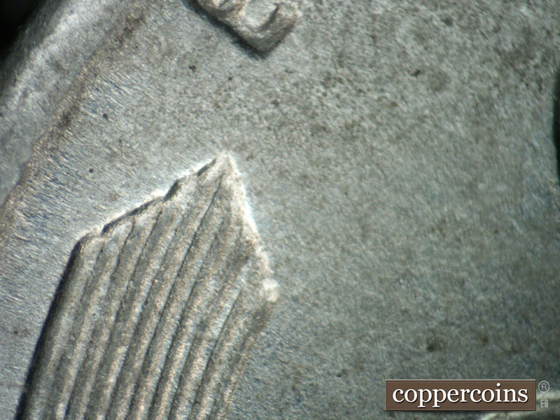 Die-stage B marker on 1943D•1DR•012 (1943 Doubled Die Reverse).