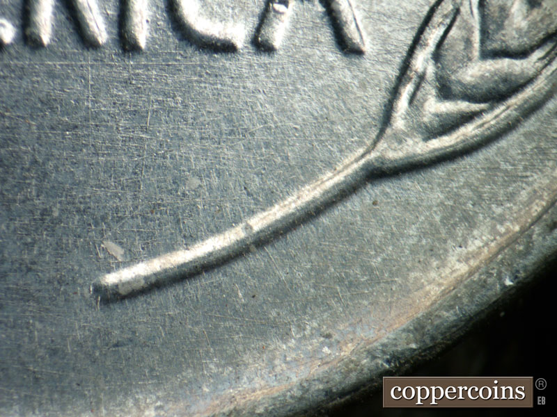 Die-stage B marker on 1943D•1DR•013 (1943 Doubled Die Reverse).