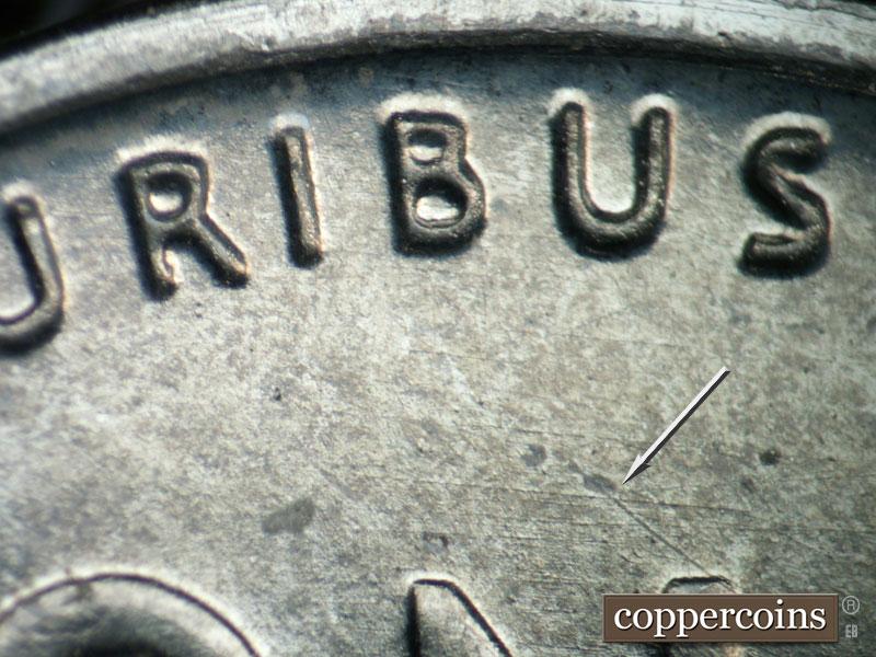 Die-stage B marker on 1943D•1DR•013 (1943 Doubled Die Reverse).