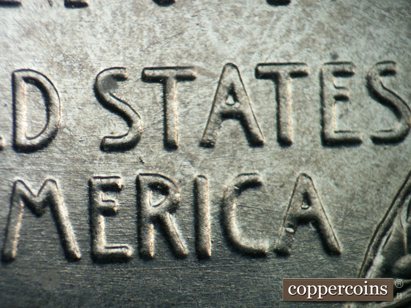 Die-stage B marker on 1943D•1DR•013 (1943 Doubled Die Reverse).