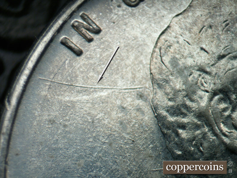 Die-stage B marker on 1943D•1DR•013 (1943 Doubled Die Reverse).