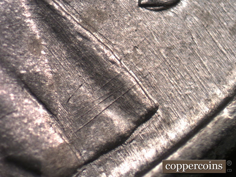 Die-stage B marker on 1943D•1MM•003 (1943 Repunched Mint Mark).