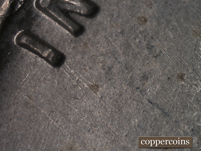 Die-stage B marker on 1943D•1MM•003 (1943 Repunched Mint Mark).