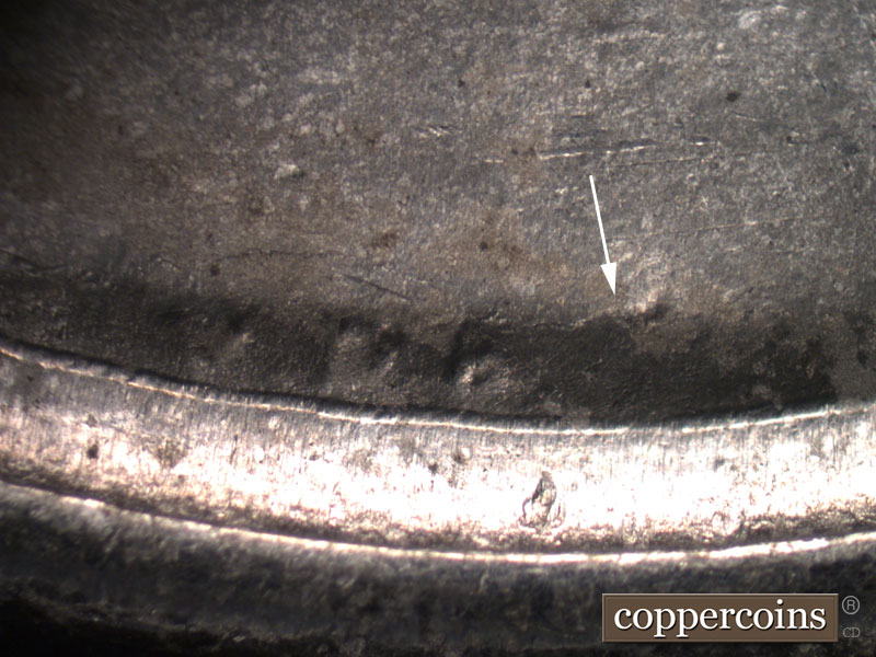 Die-stage B marker on 1943D•1MM•003 (1943 Repunched Mint Mark).