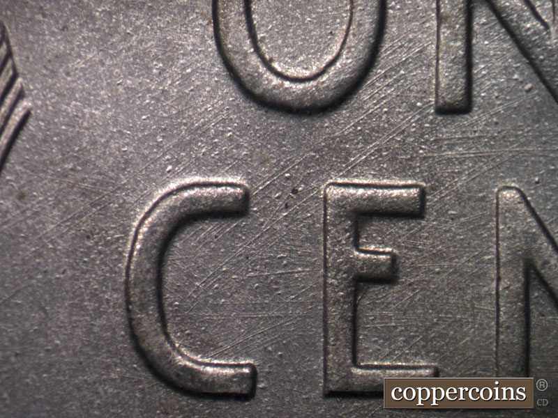 Die-stage B marker on 1943D•1MM•003 (1943 Repunched Mint Mark).