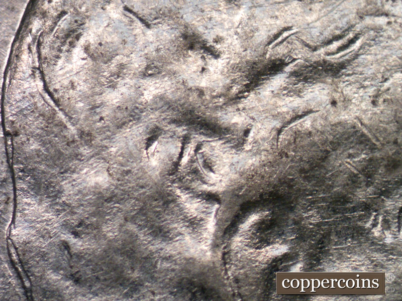 Die-stage B marker on 1943D•1MM•004 (1943 Repunched Mint Mark).