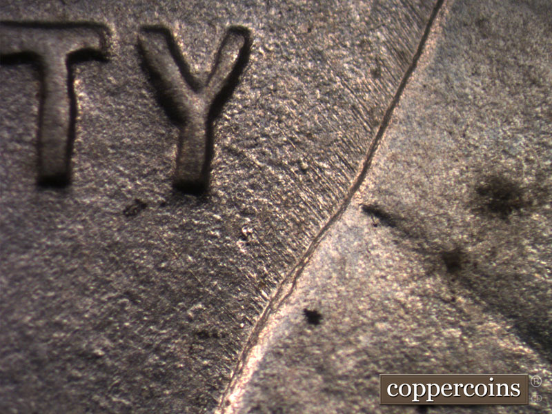 Die-stage B marker on 1943D•1MM•011 (1943 Repunched Mint Mark).