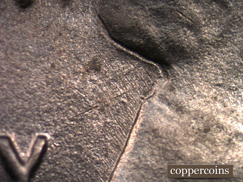 Die-stage B marker on 1943D•1MM•011 (1943 Repunched Mint Mark).