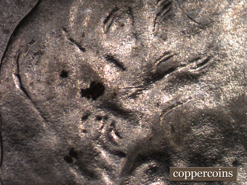 Die-stage B marker on 1943D•1MM•011 (1943 Repunched Mint Mark).