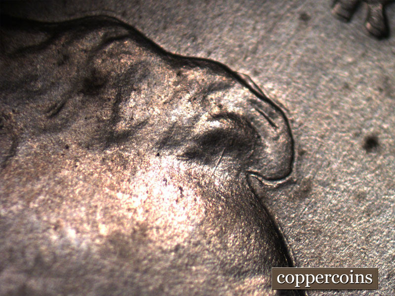 Die-stage B marker on 1943D•1MM•011 (1943 Repunched Mint Mark).