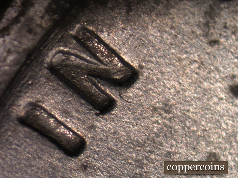 Die-stage B marker on 1943D•1MM•011 (1943 Repunched Mint Mark).
