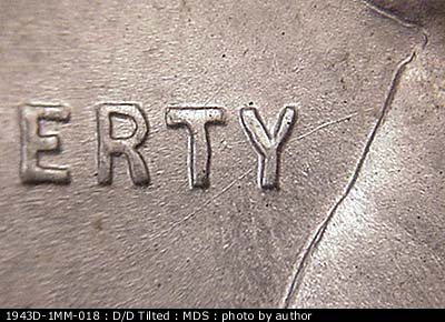 Die-stage B marker on 1943D•1MM•018 (1943 Repunched Mint Mark).