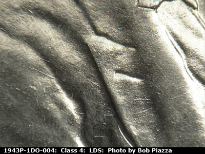 Die-stage C marker on 1943P•1DO•004 (1943 Doubled Die Obverse).