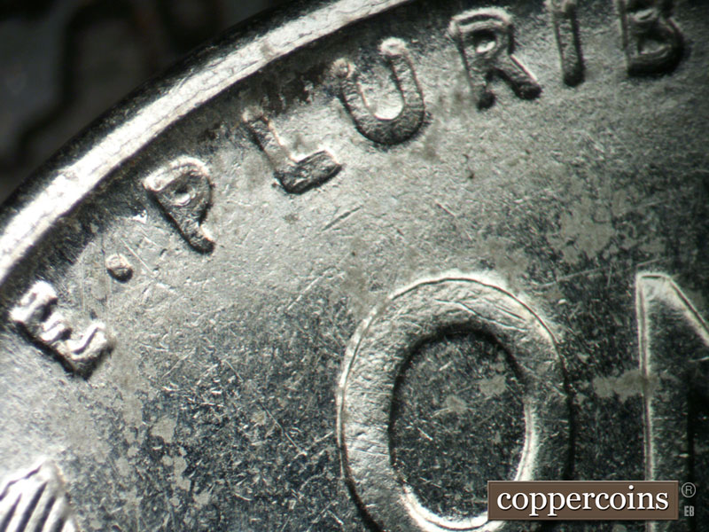 Die-stage B marker on 1943P•1DO•008 (1943 Doubled Die Obverse).